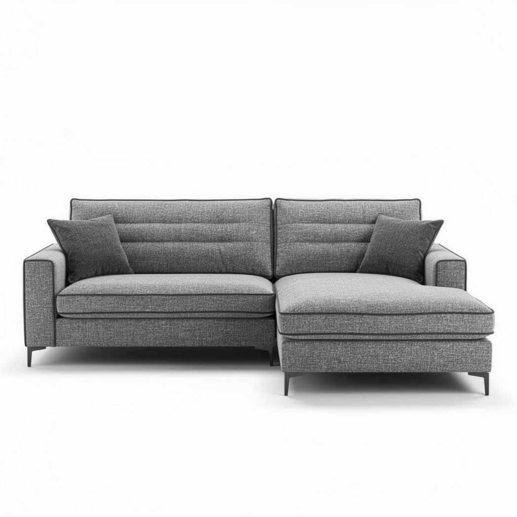 Gray fabric sectional sofa with chaise lounge and two accent pillows